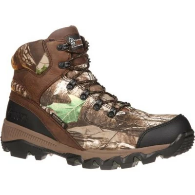 Rocky® AdaptaGrip Waterproof Outdoor Boots are designed to keep you going on the hunt. The adaptable outsole is made of rugged rubber for extra grip and slip resistance. Your feet are guaranteed to stay dry despite mud or rain thanks to Rocky Waterproof Construction. A great choice for hunting boots, the AdaptaGrip is durable and looks great because it's made of brown full-grain leather and Realtree Xtra® Green camo nylon. These outdoor boots are comfortable. The Terra Suspension insole is tough enough for any terrain. It has a durable polyurethane arch and heel, contoured to fit for support and comfort. The rubber skin outsole has comfort zone inlays for supreme comfort, maximum cushioning and lasting energy to keep you going all day. Hunt all day in comfortable waterproof boots.