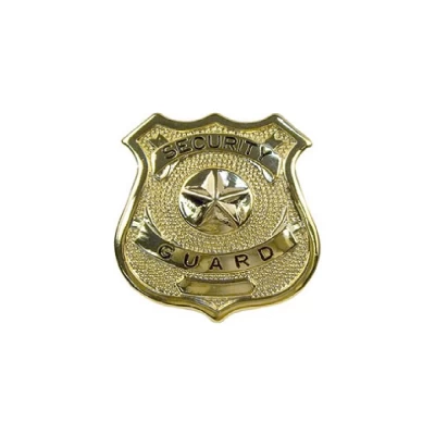 Gold Security Guard Badge. Made From Heavy Duty Nickel Plated Metal With Pin Back Closure. Security Guard Printed On Front In Black Lettering And Star In Center of Badge. There Is A Place Place For A Number To Be Engraved. Dimensions: 2.25" Wide x 2.5" High.