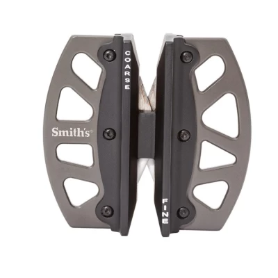 Manual knife sharpener from Smith's, equipped with a double sharpening system. Carbide and ceramic rods, built into a convenient stainless steel grip, allow you to carry out sharpening knives or penknives in all conditions. It will work well as part of a survival kit! The tool has two sharpeners: carbide, Coarse-grade to repair a blunt or damaged blade, and ceramic - fine-grade to smooth the edge and sharpen it. The sharpening stones are placed at a fixed 20 degree angle. The sharpener's grip is made of stainless steel, embedded on a plastic frame, which ensures resistance to mechanical damage and durability. A well-thought-out design ensures stability during sharpening. The skeleton construction of the grip reduces weight and allows the attachment of a lanyard or retractor. - Size: 64.3 x 67.5 x 22.5 mm - Weight: 59 g - Material: Stainless steel + plastic