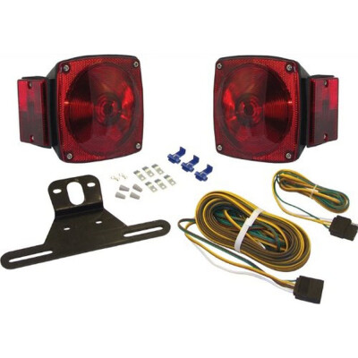 The shoreline marine trailer light kit conv. Basic is for use on trailers under 80" wide. This submersible multi-function 12V light kit includes right and left taillights, 25" wishbone wiring harness, 48" trunk Connector license plate bracket and mounting hardware.